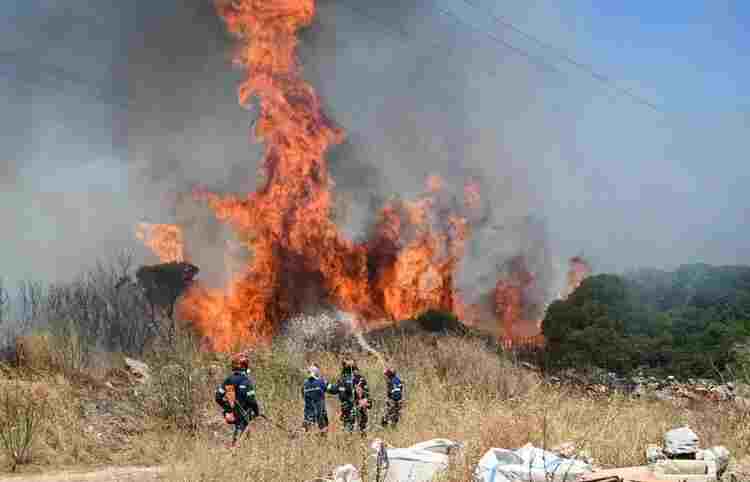Greece in Crisis: Wildfires Through Country as Temperatures Soar